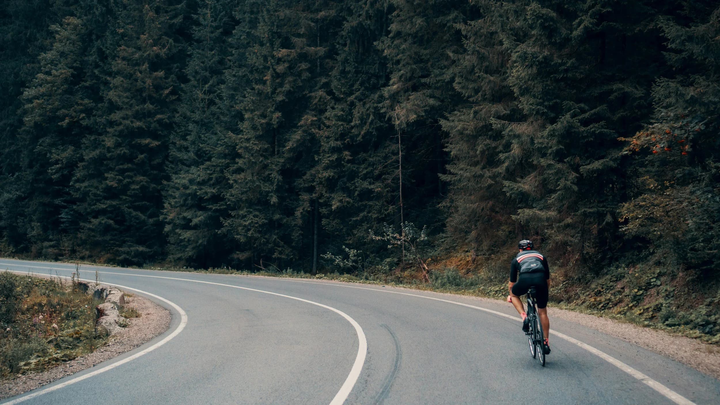 A cyclist mid-ride